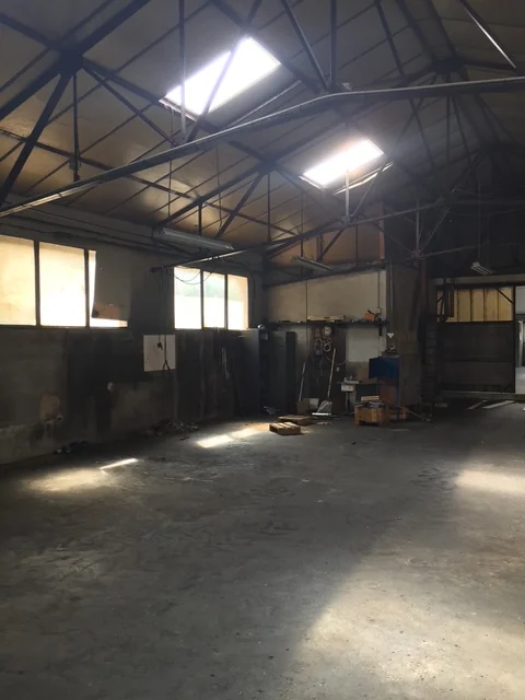 Hangar industriel vide avant les travaux de la Brasserie Mazesté